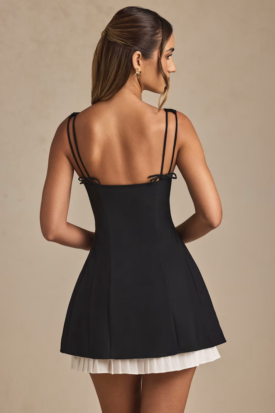 Bow-Detail Pleated A-Line Mini Dress in Black – Elegant & Flattering