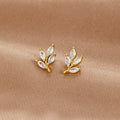 Vioraia Crystal Leaf Stud Earrings