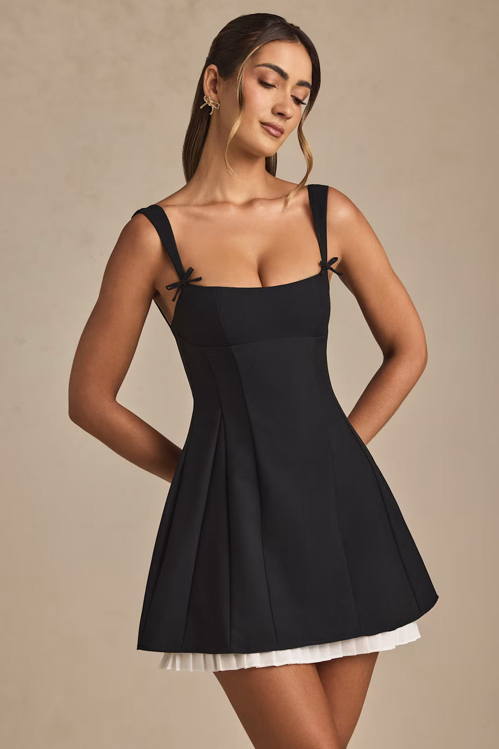 Bow-Detail Pleated A-Line Mini Dress in Black – Elegant & Flattering